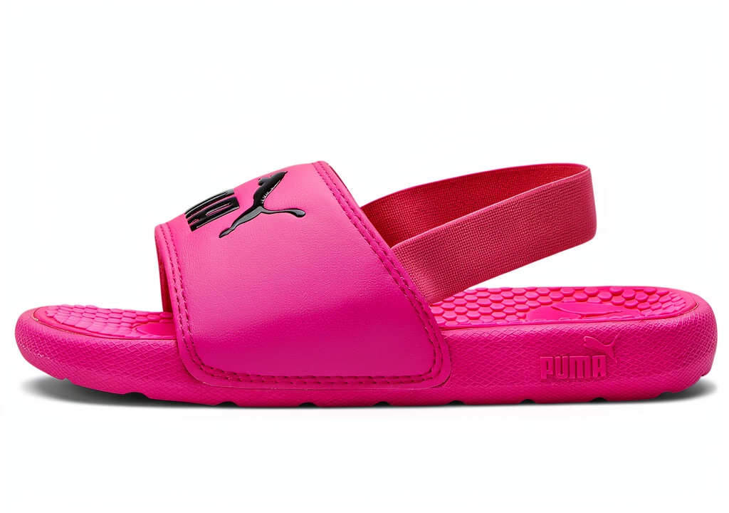 PUMA girls sport sandals in pink color on a neutral background