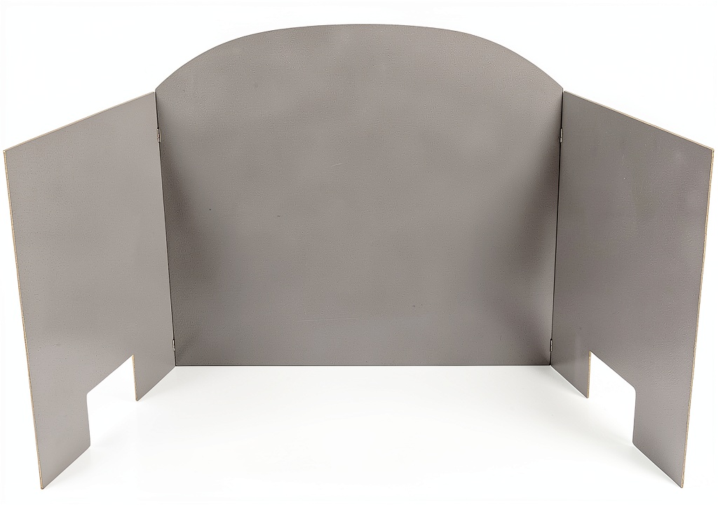 Stainless steel fireplace heat shield installed in a modern living room